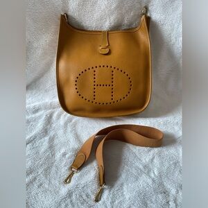 HERMES Evelyn 1 GM Shoulder Bag Taurillon Clemence Leather - Mustard Brown